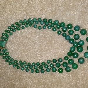 A VINTAGE FAUX JADE PLASTIC 3 LAYERED  NECKLACE. SB.18